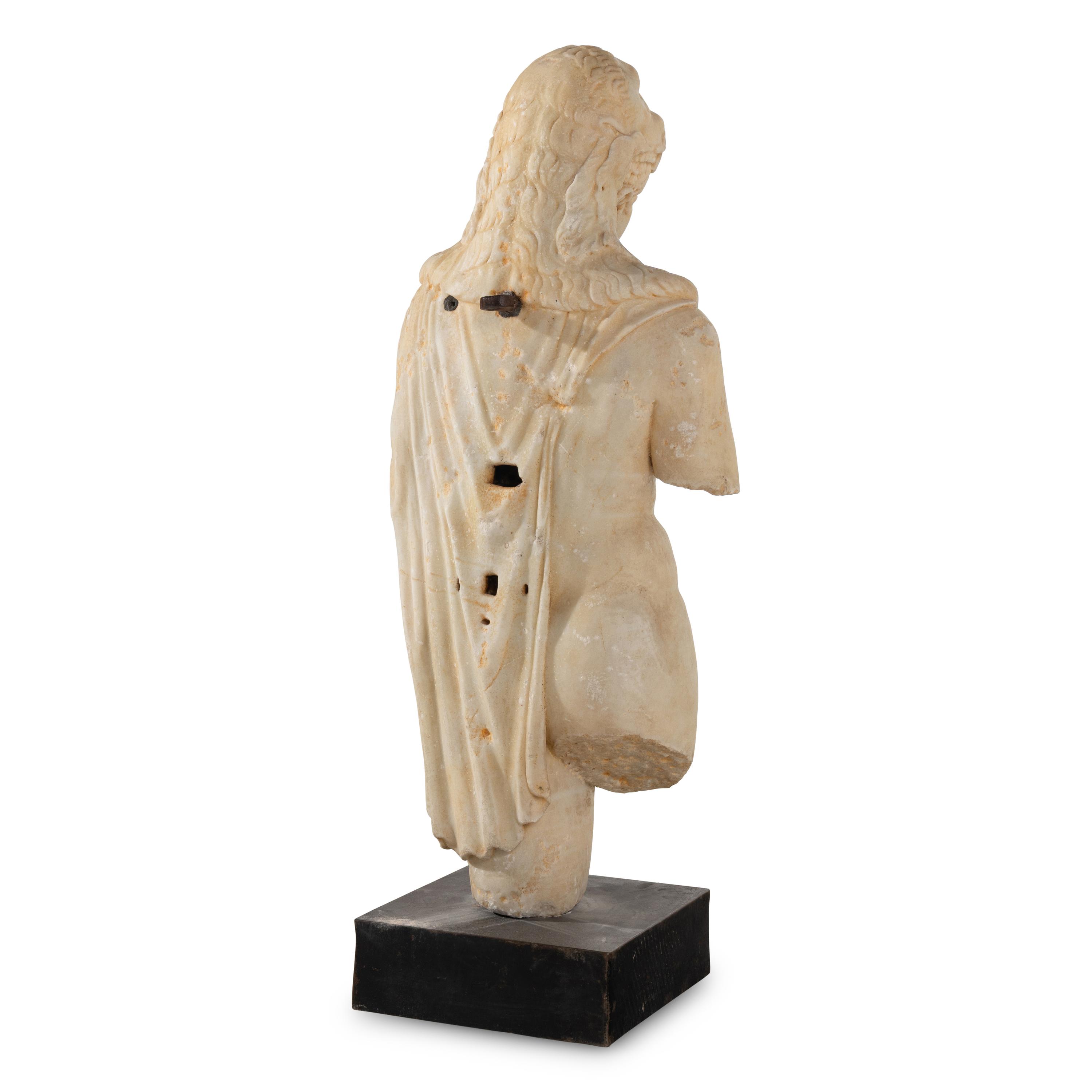 An Italian Carved Marble Torso of Hercules