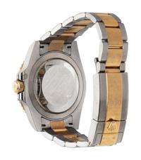 ROLEX, REF. 116713 STAINLESS STEEL AND YELLOW GOLD 'GMT-MASTER II' WATCH, BOX & PAPERS