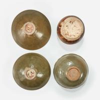 Group of three Vietnamese molded bowls and a molded box and cover Ly to Tran dynasties 11th -14th century