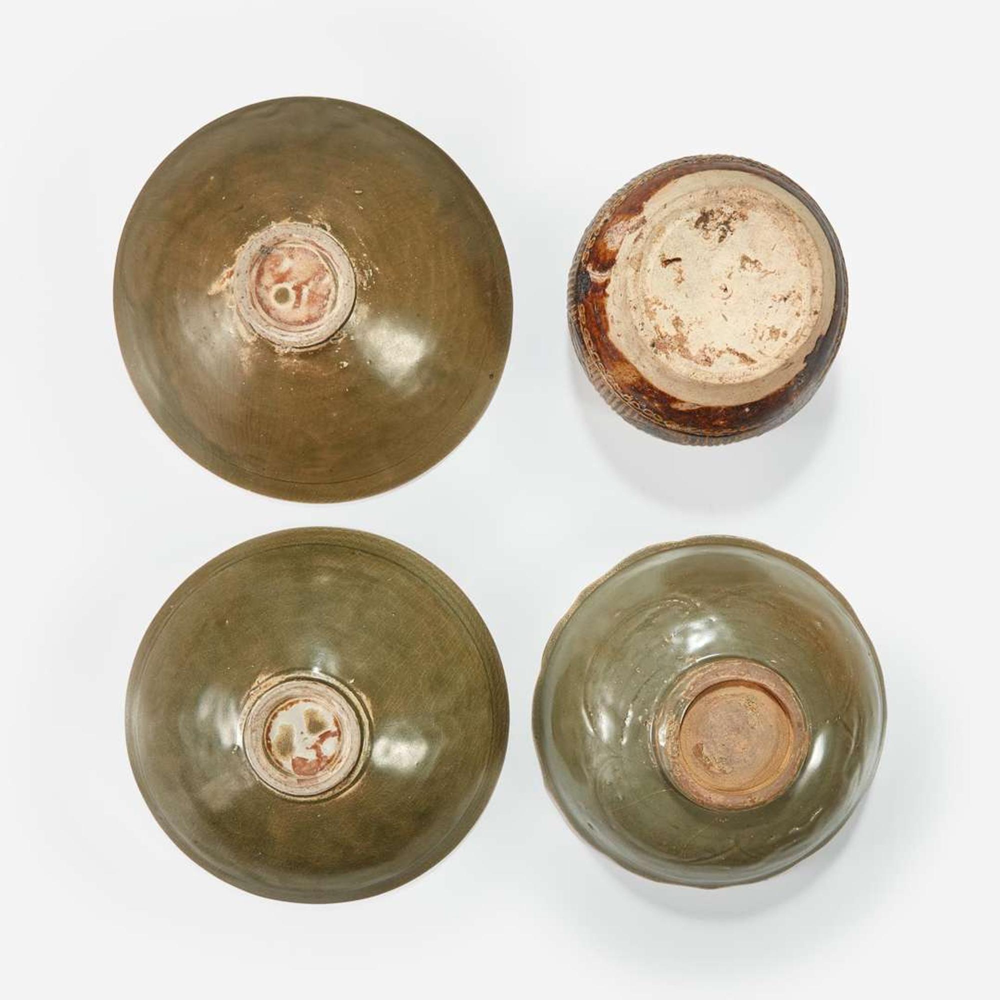 Group of three Vietnamese molded bowls and a molded box and cover Ly to Tran dynasties 11th -14th century