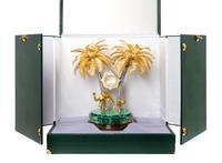 A Gilt Metal and Malachite Veneered Clock Height 18 1/2 inches. — MODERN