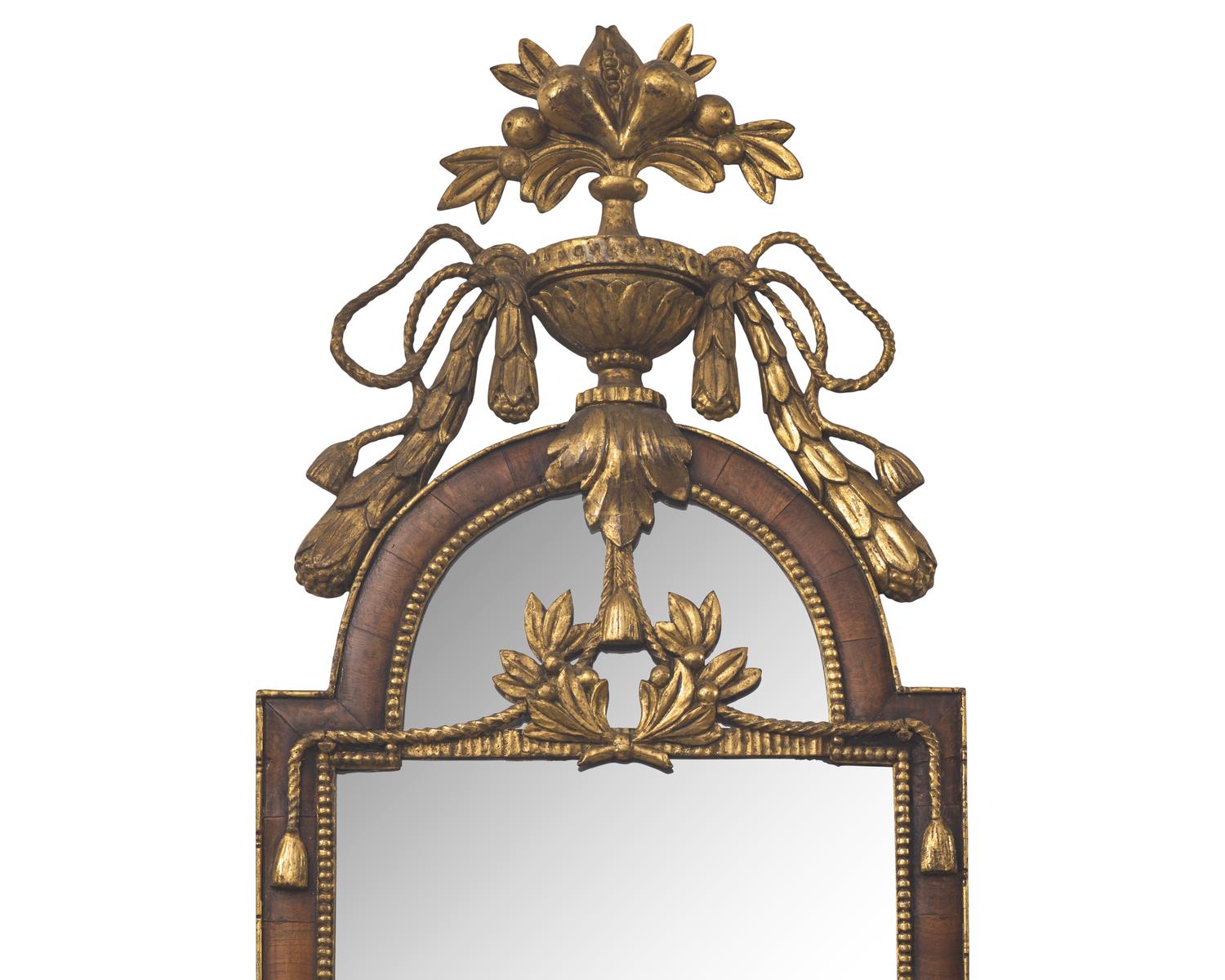 A Spanish "Bilbao" Walnut-Veneered and Parcel-Gilt Mirror For the American Market