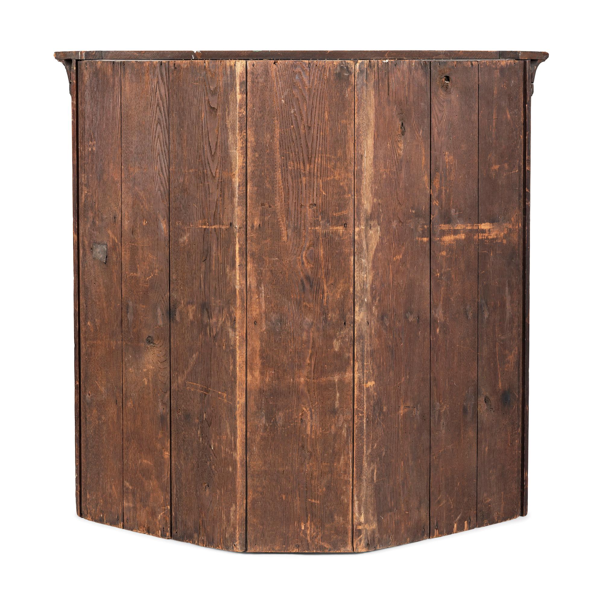 A Chippendale Incised Walnut Corner Cupboard