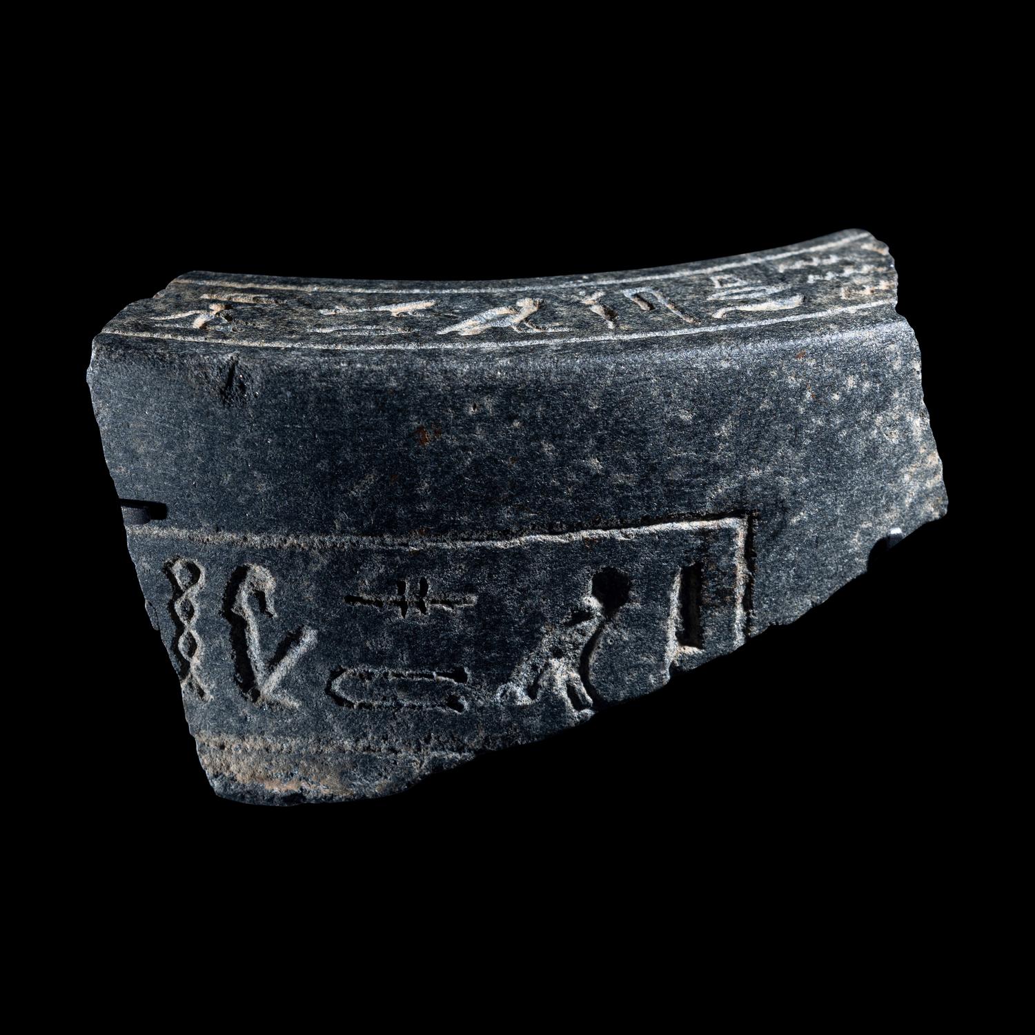 An Egyptian Granite Vessel Fragment with Hieroglyphs