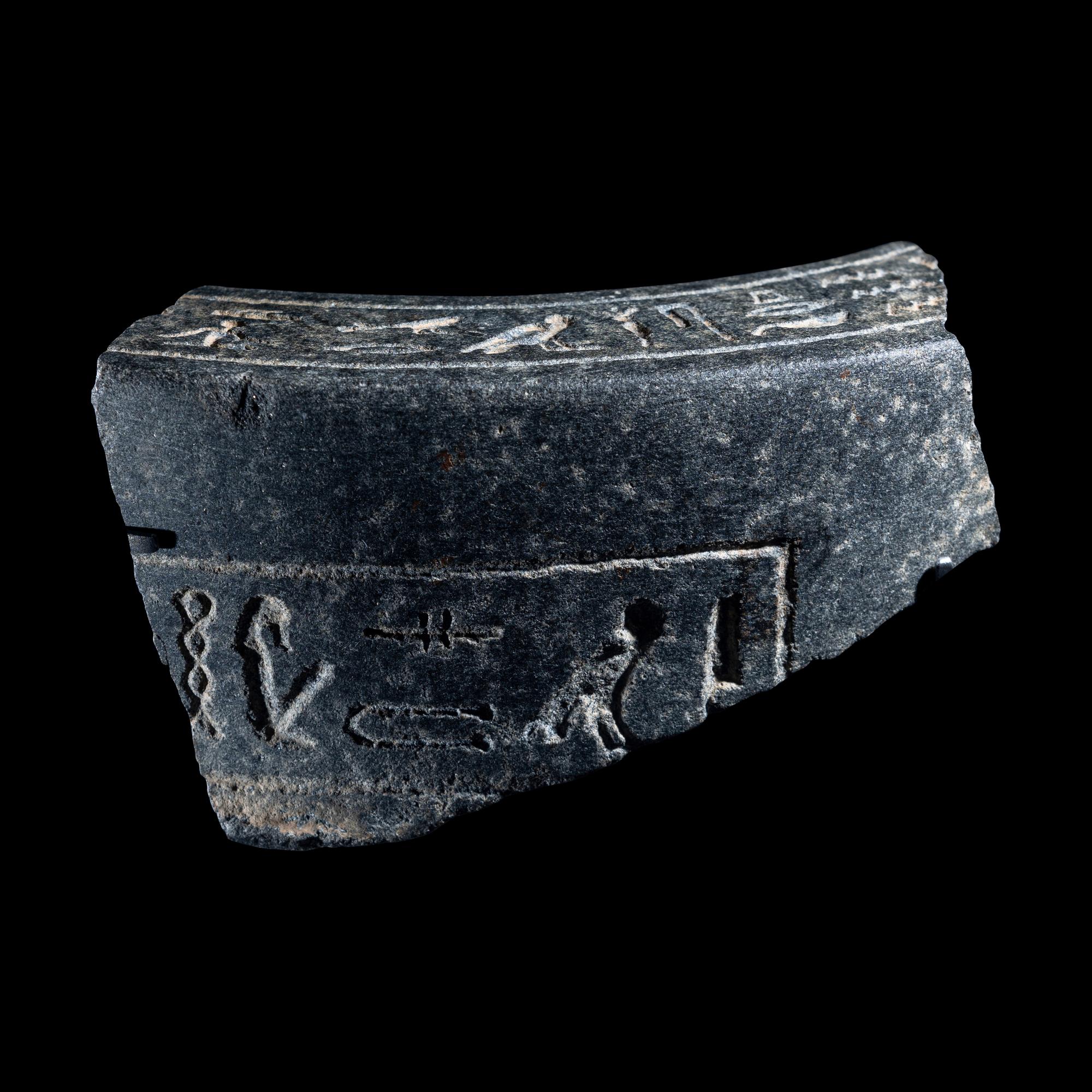An Egyptian Granite Vessel Fragment with Hieroglyphs