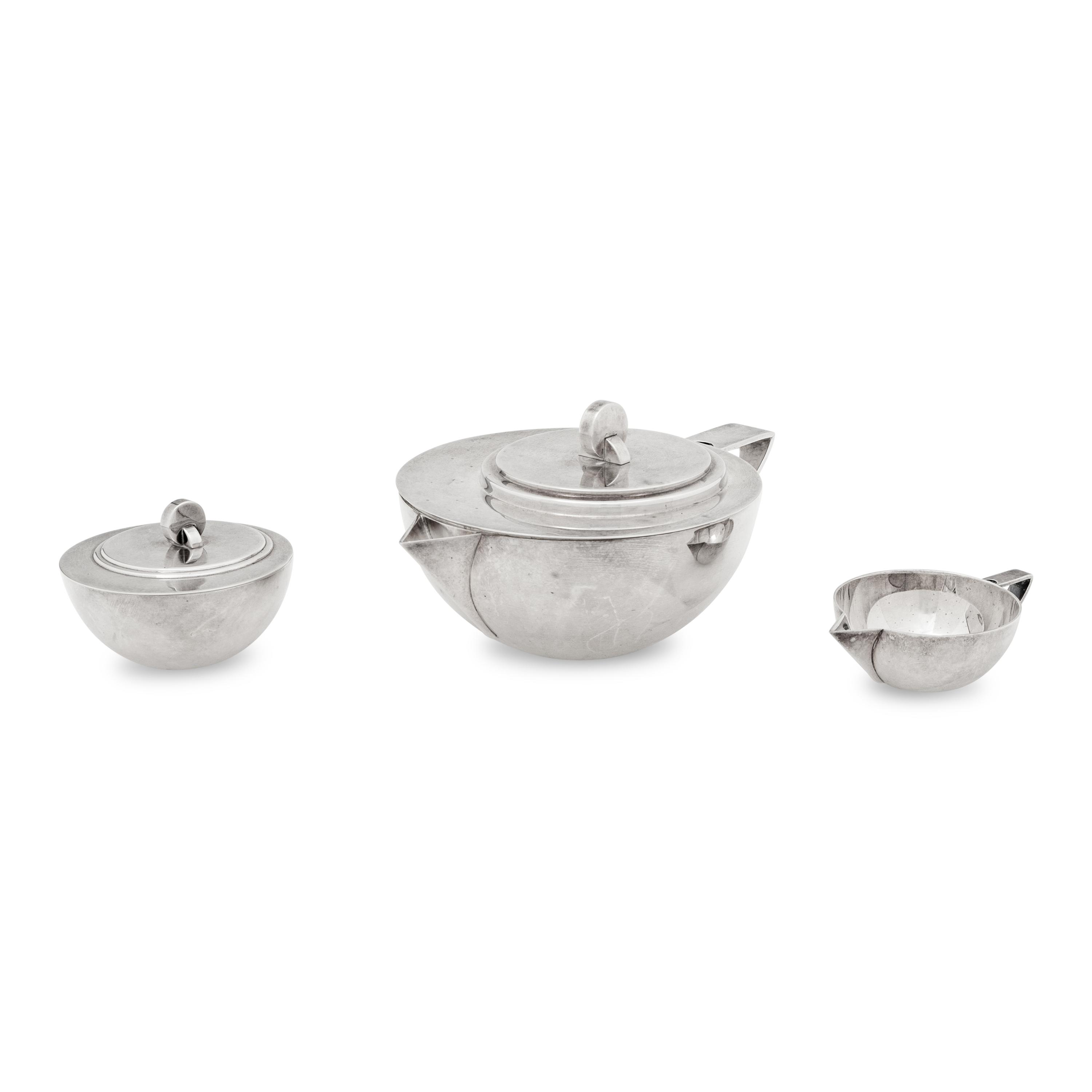 An Ercuis Silver-Plate Three-Piece Tea Service