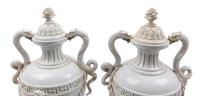 A Pair of German Blanc-de-Chine Porcelain Urns