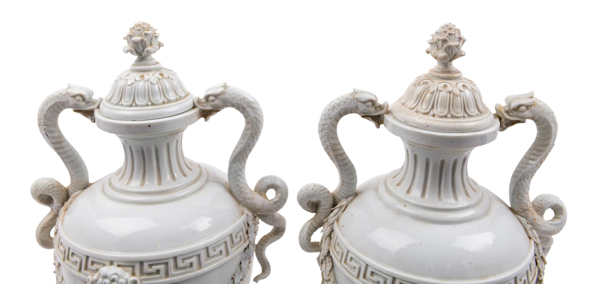 A Pair of German Blanc-de-Chine Porcelain Urns