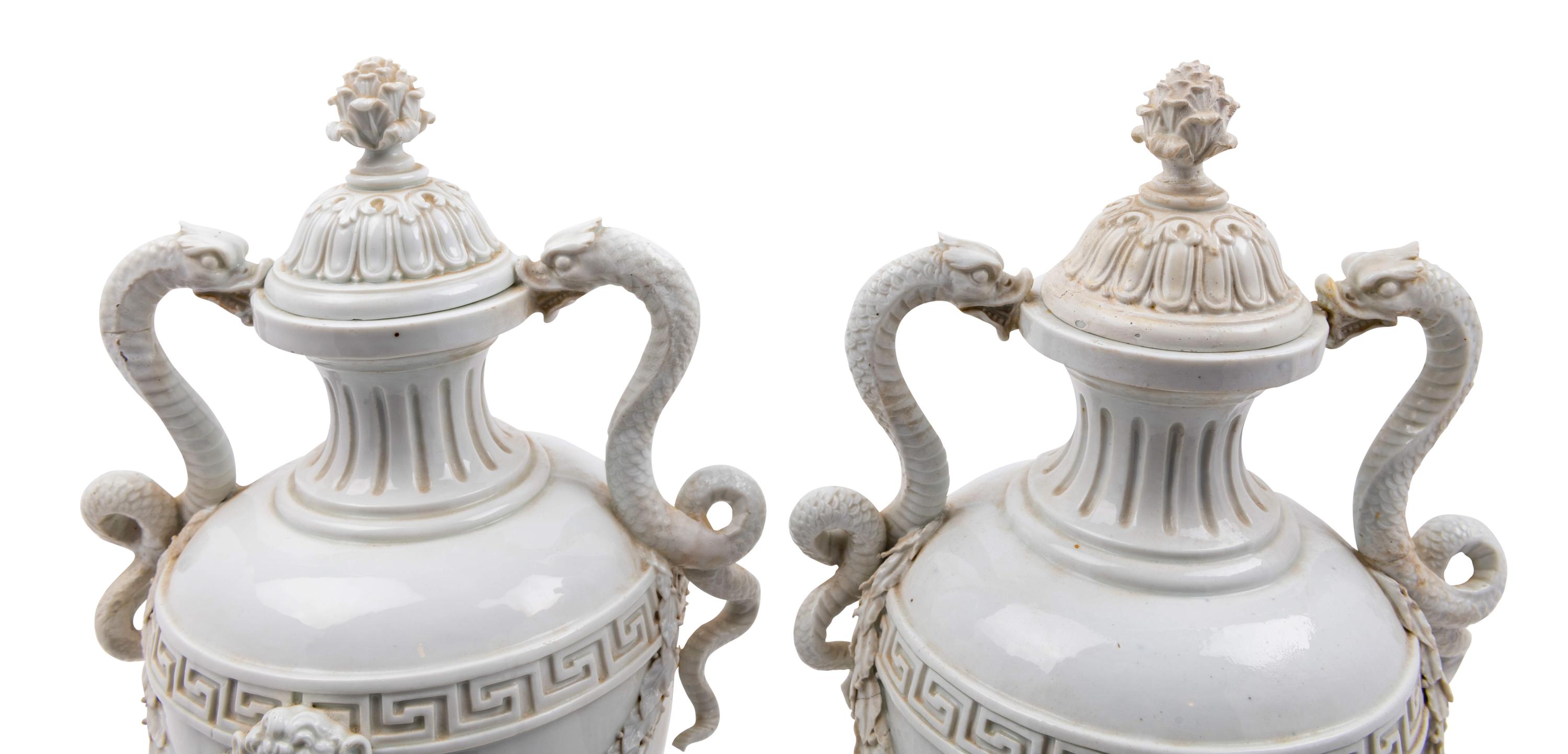 A Pair of German Blanc-de-Chine Porcelain Urns