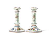 A Pair of French Faience Polychrome Candlesticks