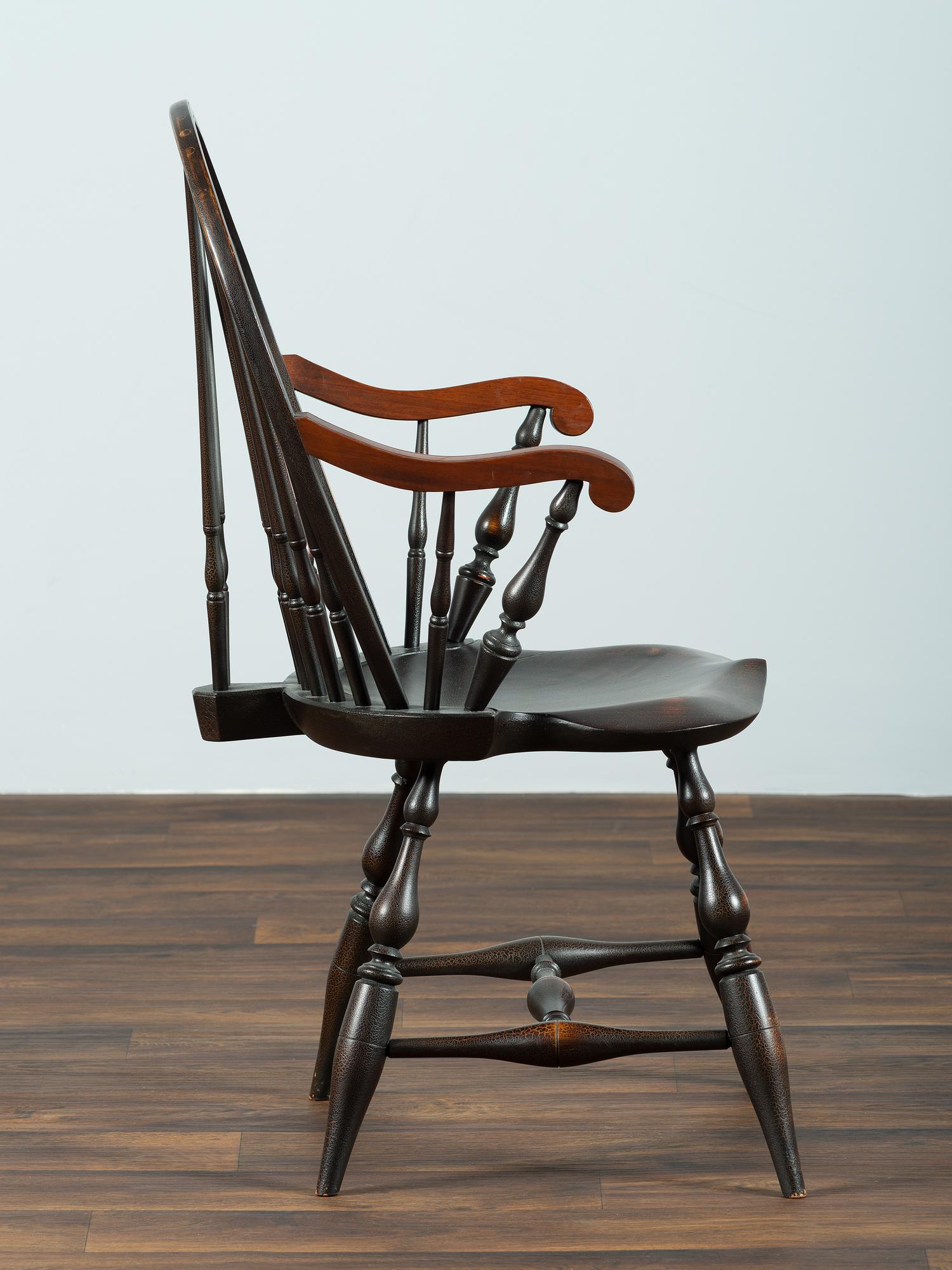 A D.R. Dimes Black-Painted Brace-Back Compass-Seat Windsor Armchair