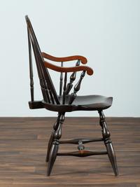 A D.R. Dimes Black-Painted Brace-Back Compass-Seat Windsor Armchair