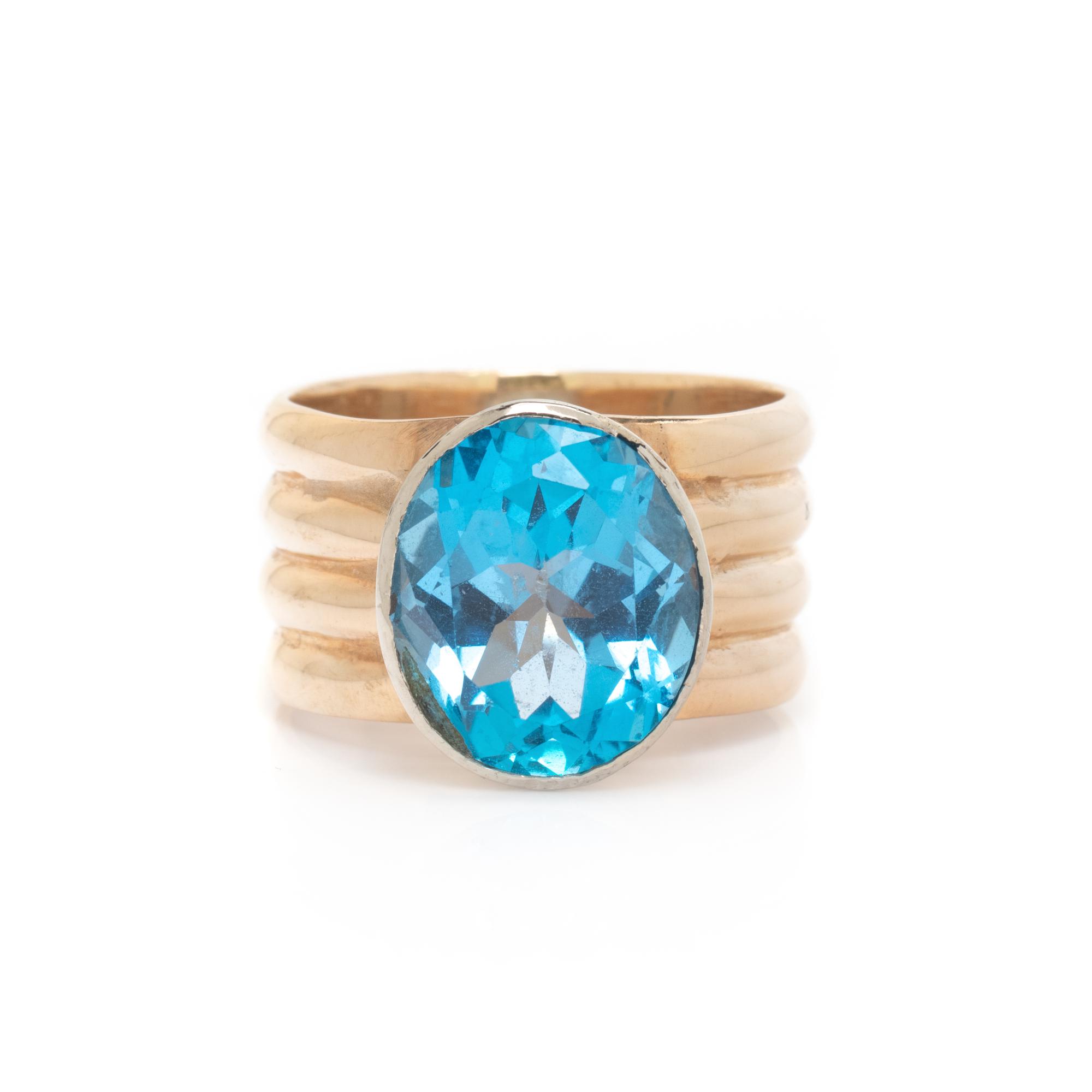 YELLOW GOLD AND BLUE TOPAZ RING