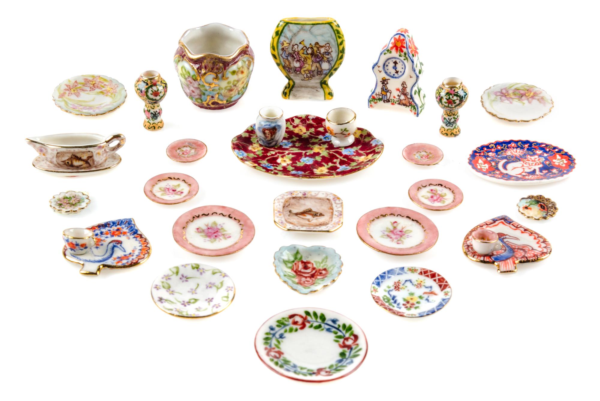 A Collection of Porcelain Table Articles Width of widest serving platter 1 7/8 inches. — Ina Williams