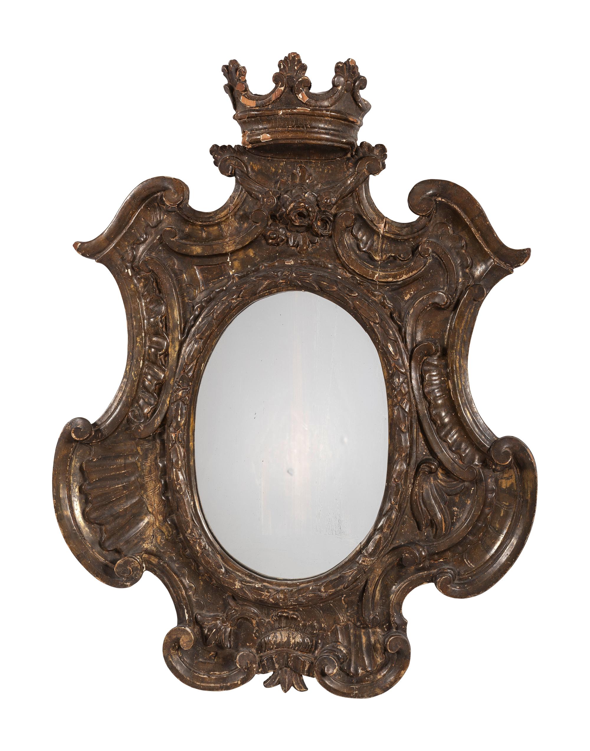 A Continental Carved, Painted and Parcel Gilt Mirror