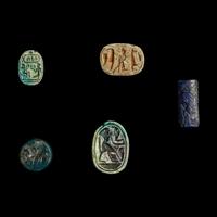 A Group of 3 Egyptian Faience Scarabs and 2 Near Eastern Stone Seals