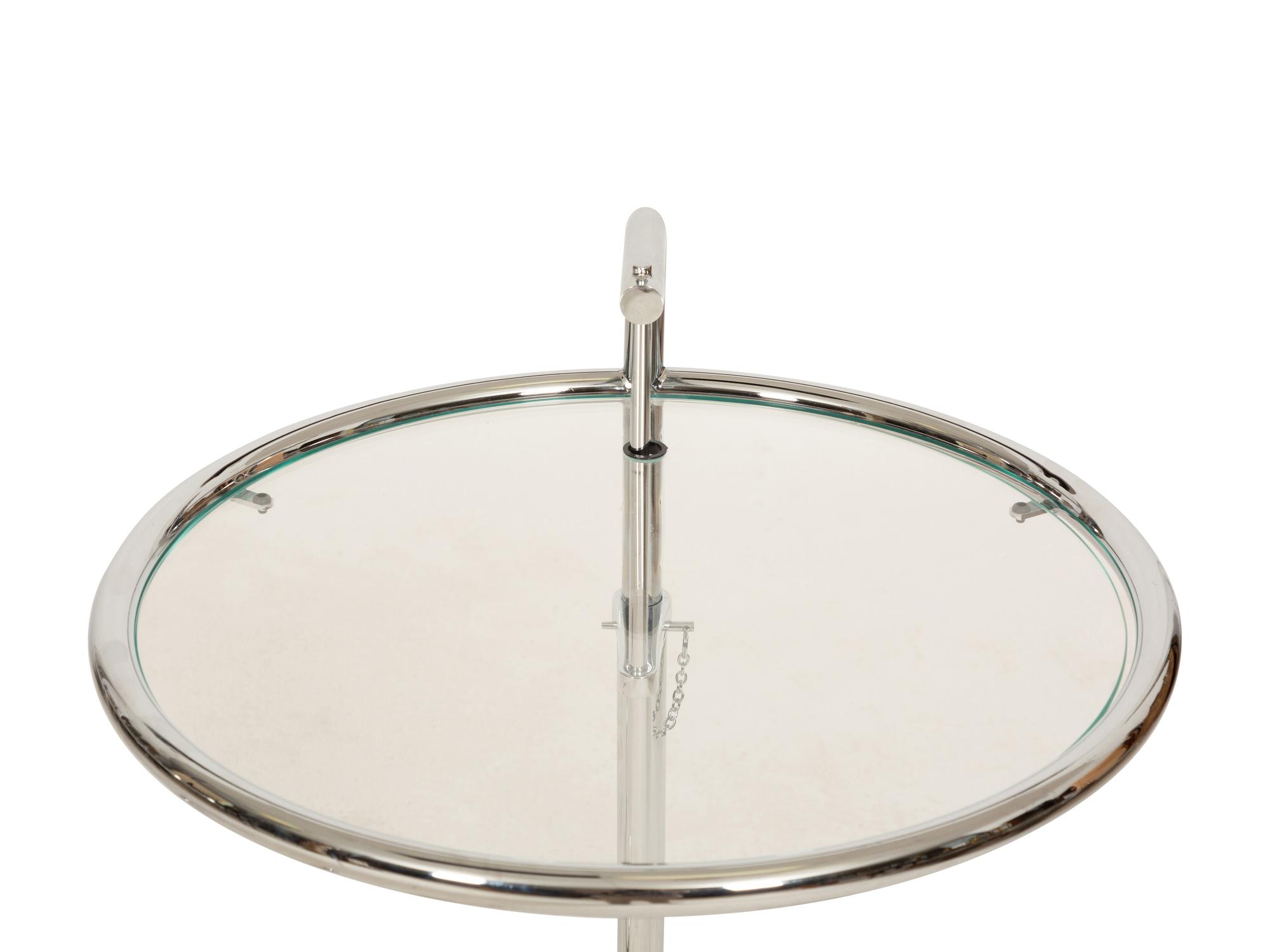 A Pair of Chrome and Glass Adjustble Side Tables