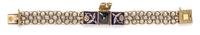 A 14 Karat Yellow Gold, Enamel and Seed Pearl Surprise Watch, 22.60 dwts.