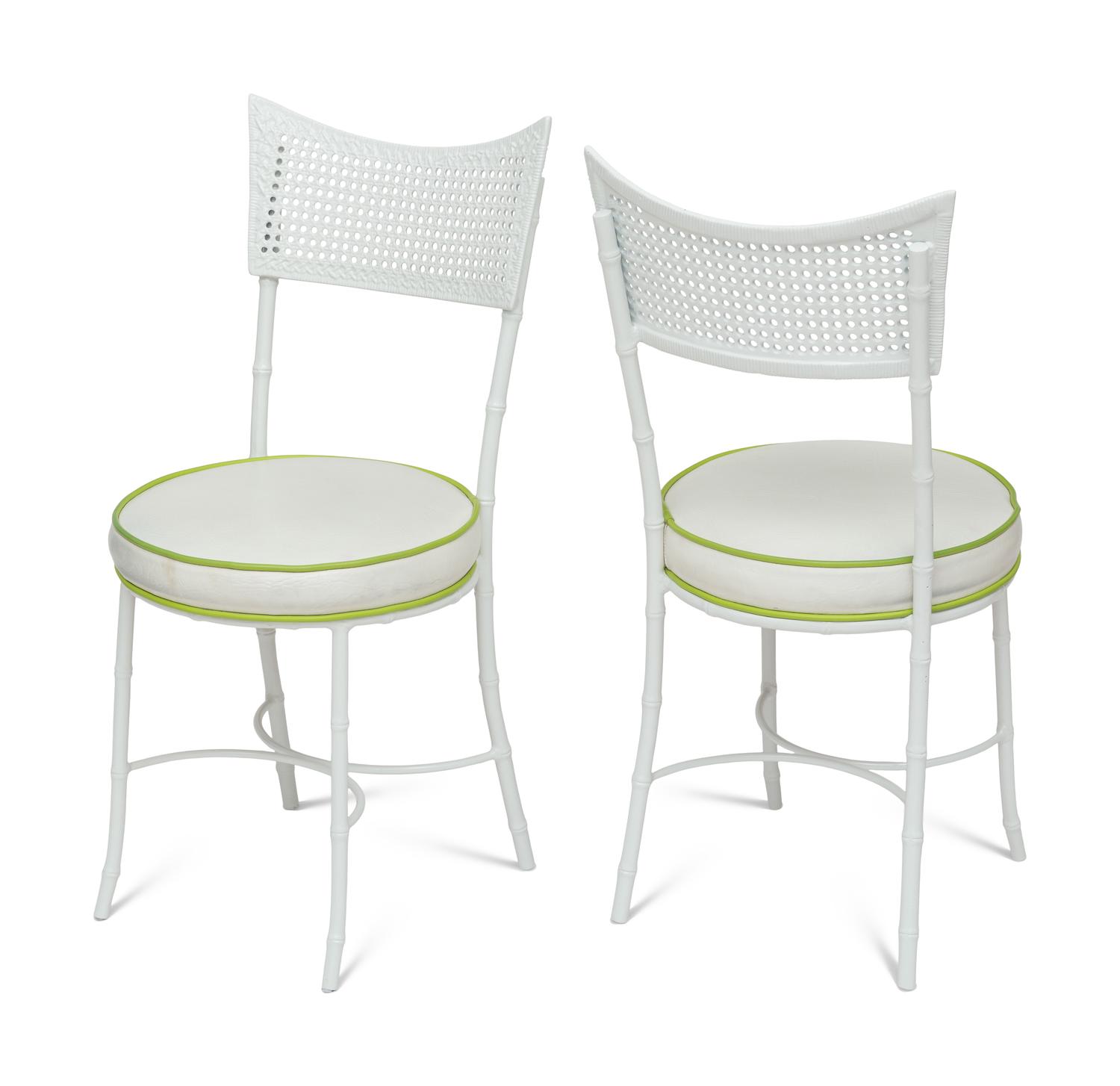A Powder-Coated Metal Five-Piece Garden Table and Chairs