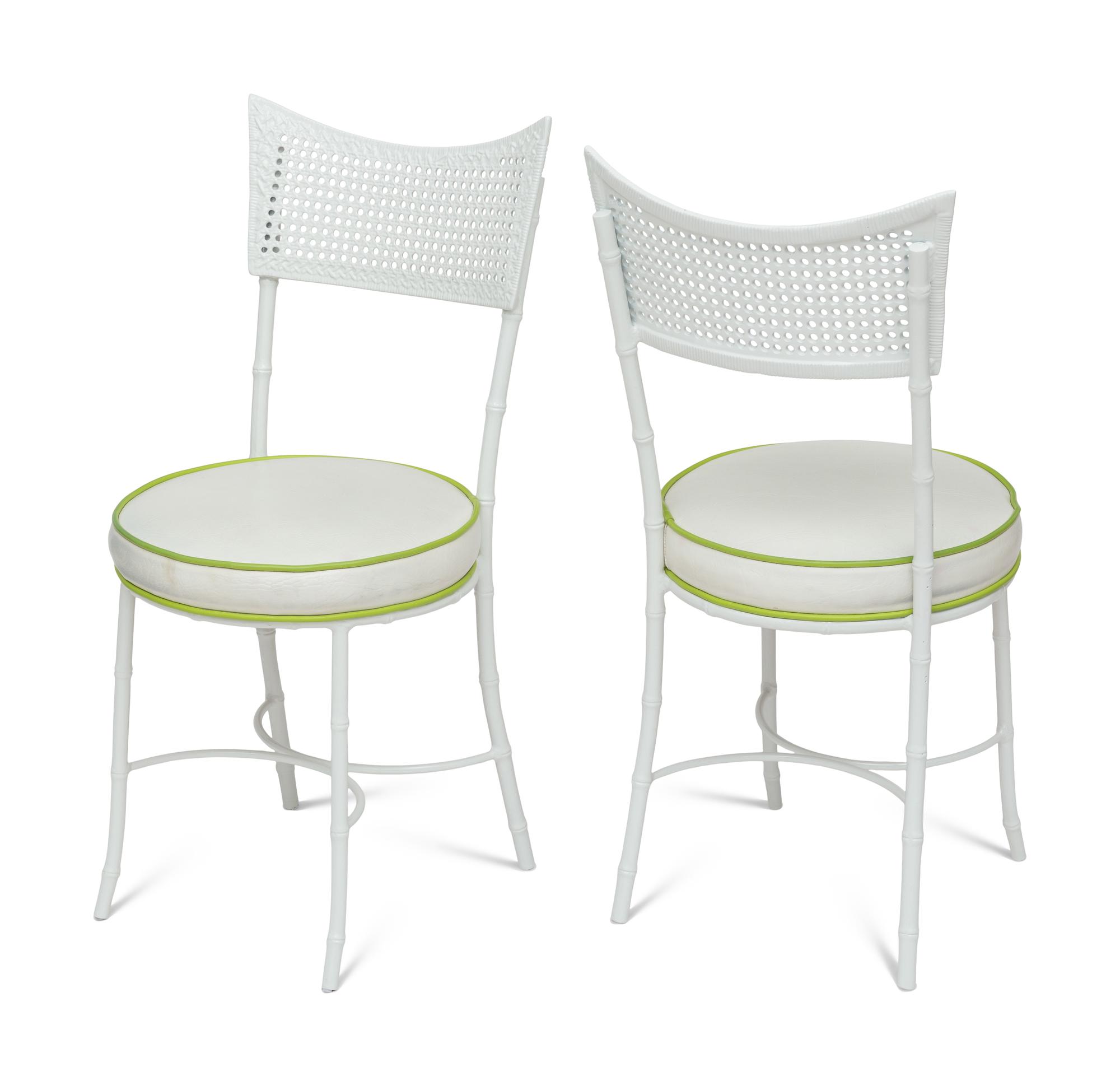 A Powder-Coated Metal Five-Piece Garden Table and Chairs