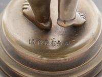 A Continental Bronze and Nautilus Shell Table Ornament