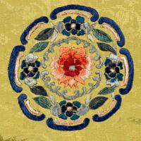 A Chinese Yellow Ground Embroidered Silk Lady's Jacket, 19th Century 清中期 黃地團花紋女大襟