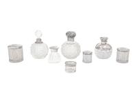 A Collection of Eight Silver Mounted Jars