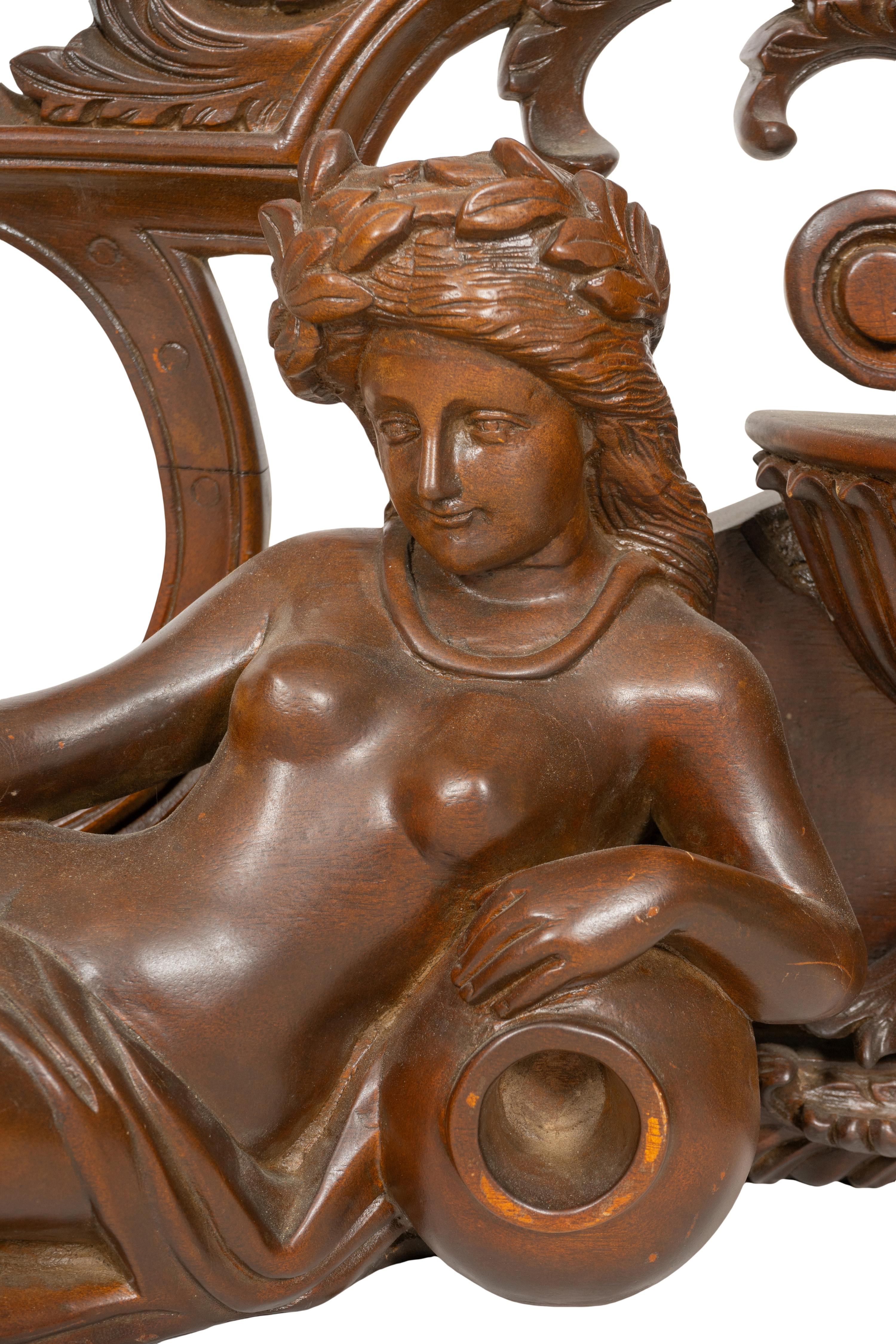 An Italian Renaissance Style Carved Mahogany Figural Transom