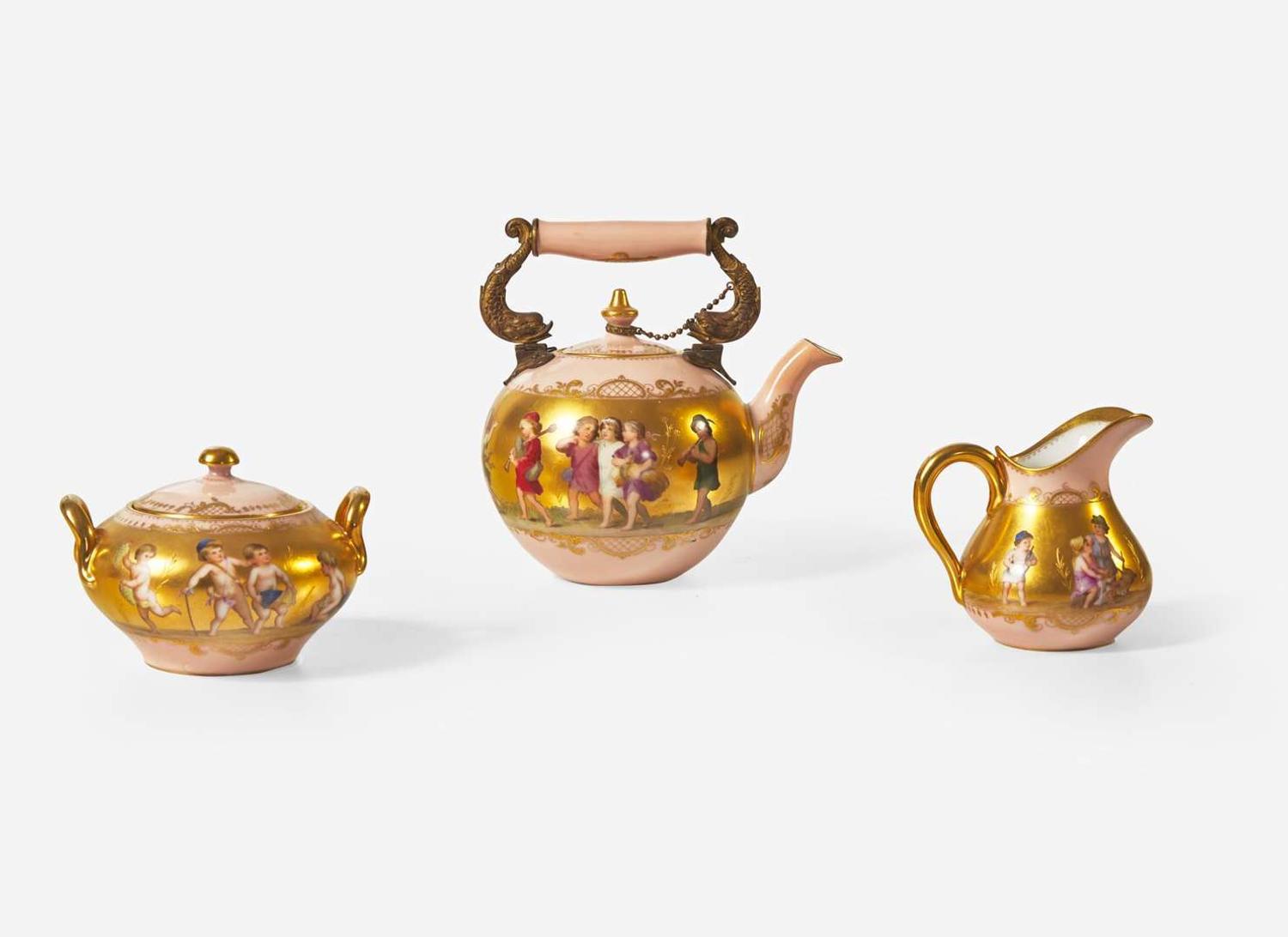 A Royal Vienna style gilt and enameled porcelain three-piece tea service, late 19th / early 20th century