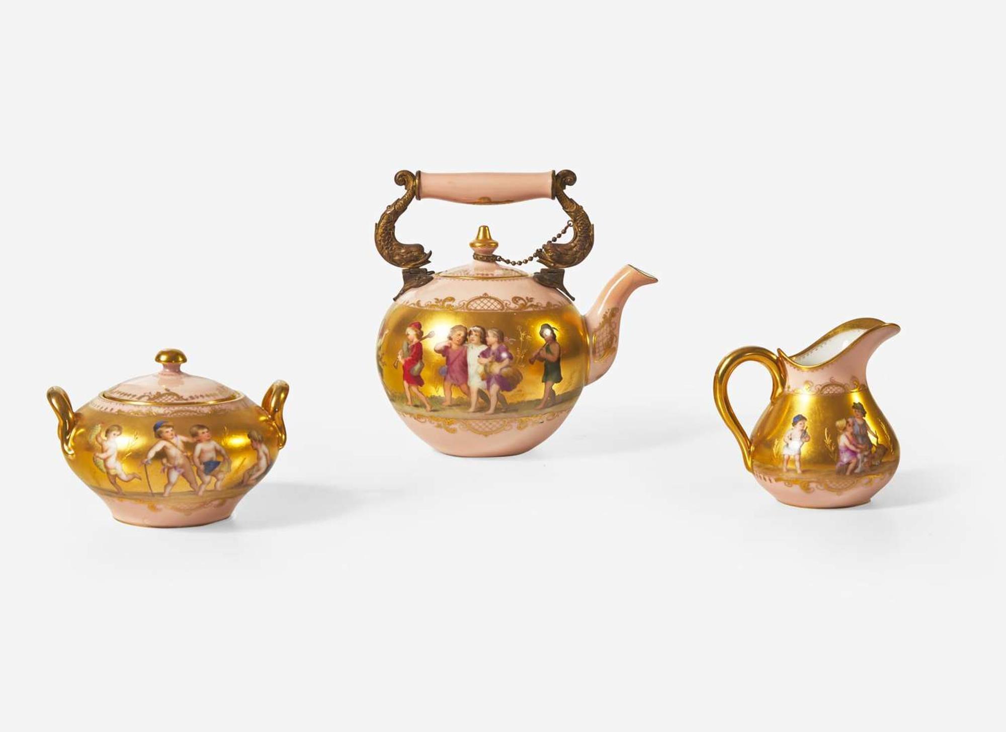 A Royal Vienna style gilt and enameled porcelain three-piece tea service, late 19th / early 20th century