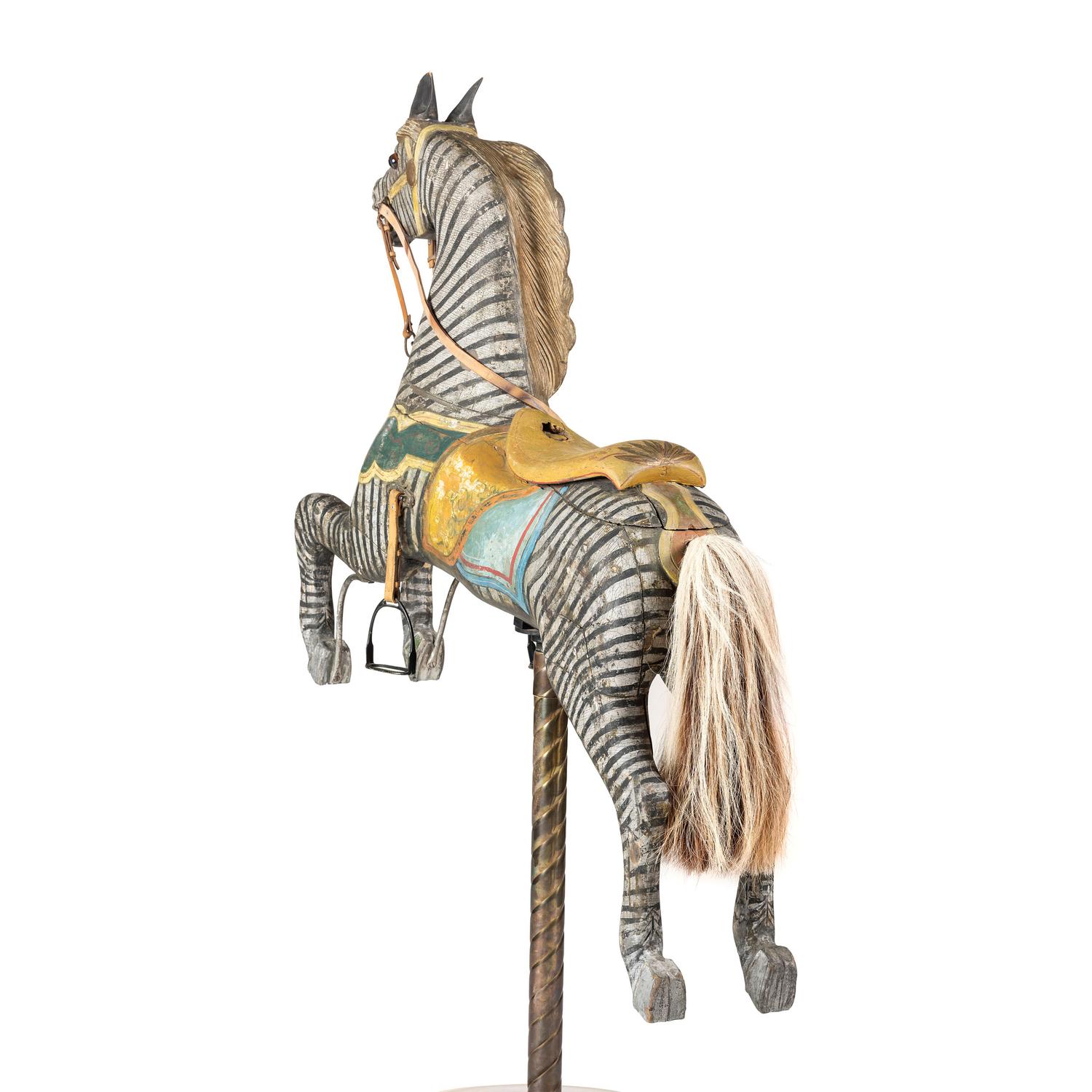 A Glass Inset Carved, Parcel-Gilt and Painted Wood Zebra Carousel Figure