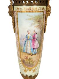 A Pair of Gilt Bronze Mounted Sèvres Style Porcelain Urns