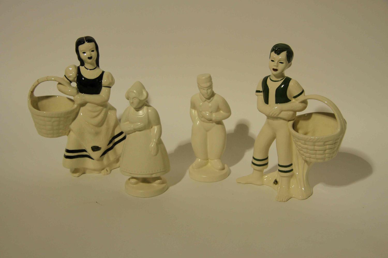 A Group of Eight Haeger Pottery Figural Vases Height of tallest 11 1/2 inches.