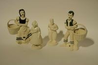 A Group of Eight Haeger Pottery Figural Vases Height of tallest 11 1/2 inches.