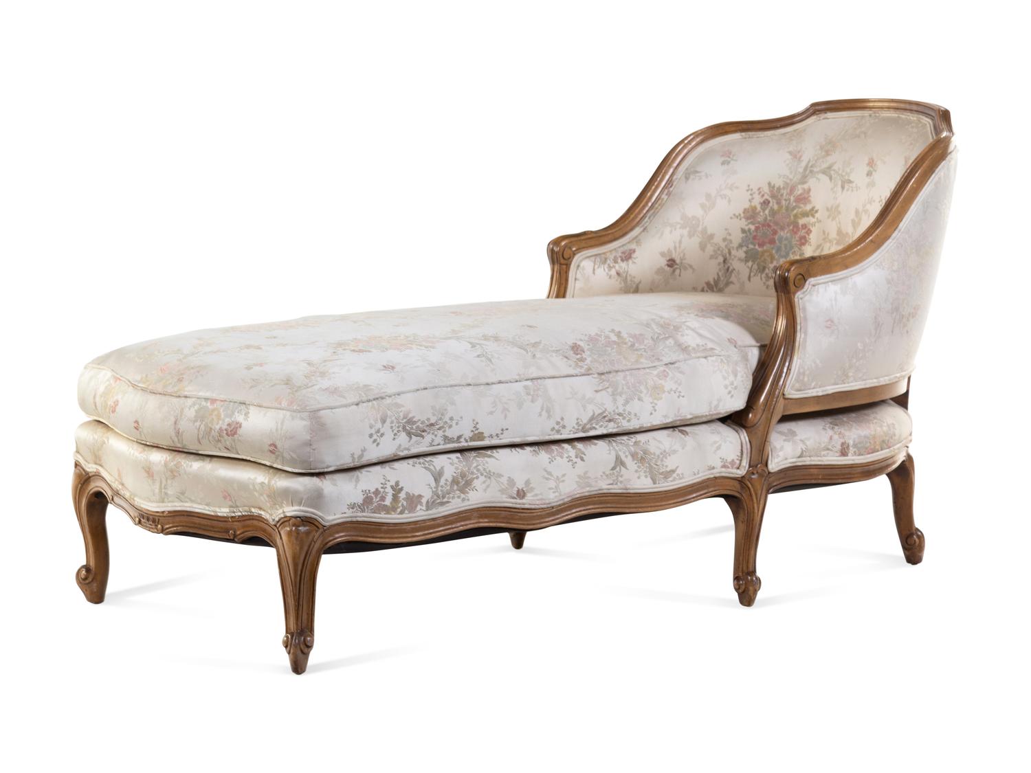 A Louis XV Style Carved Walnut Chaise Longue