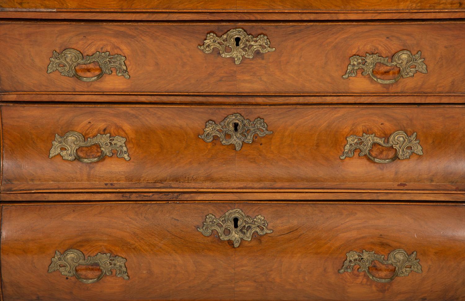 A Dutch Walnut Bombé Chest of Drawers