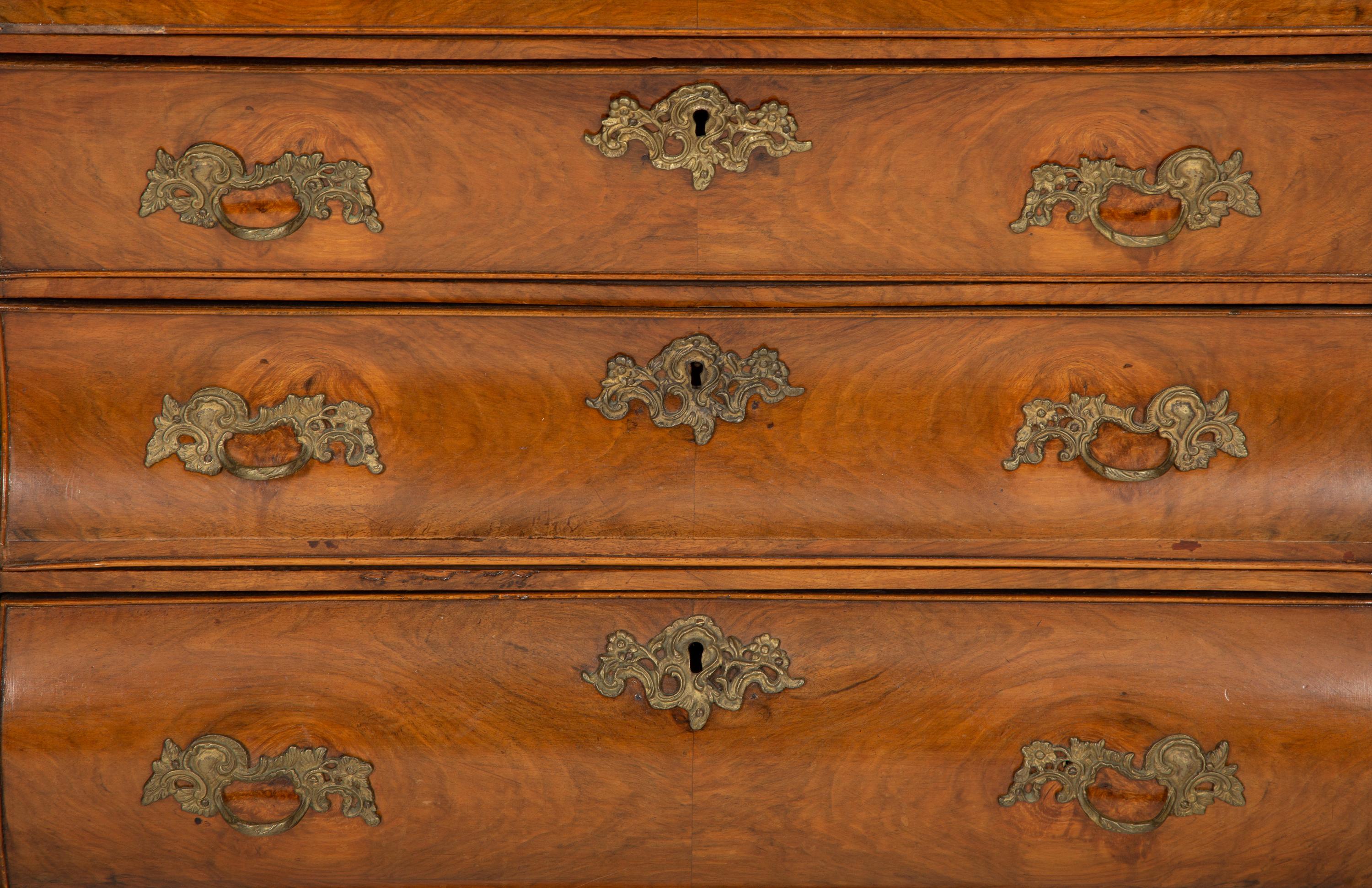 A Dutch Walnut Bombé Chest of Drawers