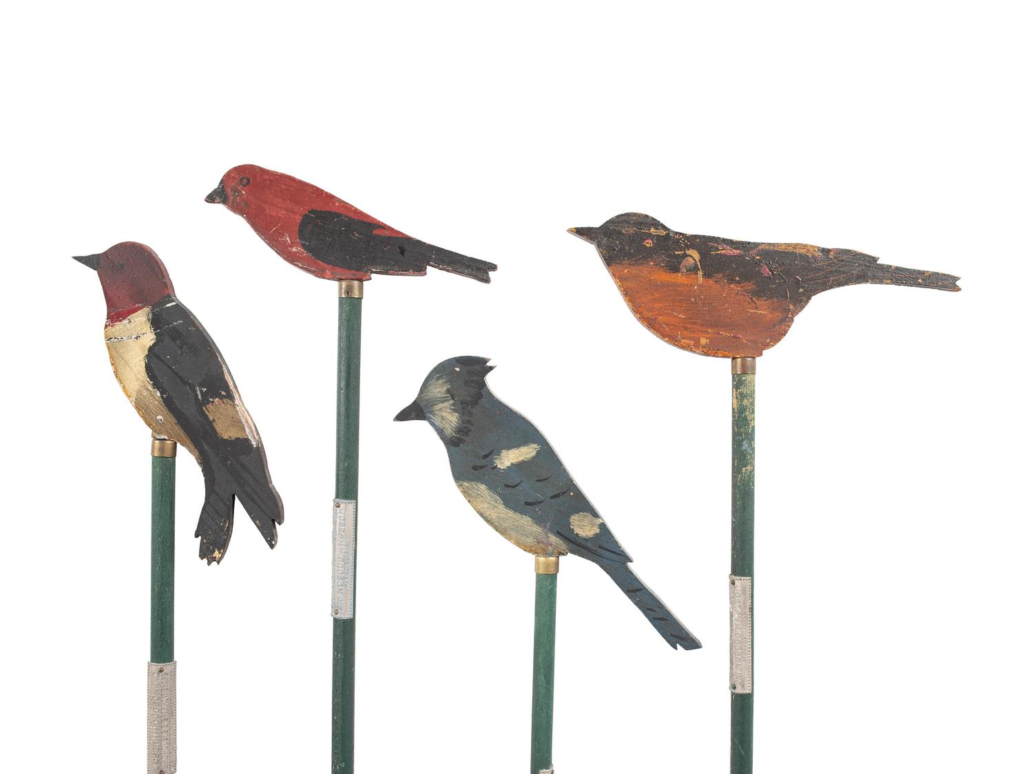 A Set of Four Joseph Dodson Carved and Painted Wooden Birds