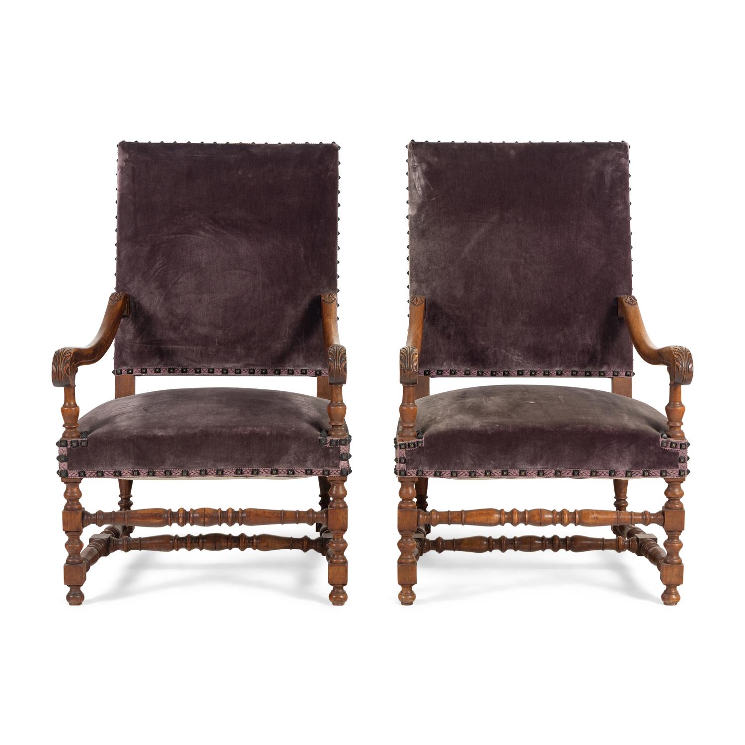 A Pair of Henry II Style Carved Fruitwood Fauteuils