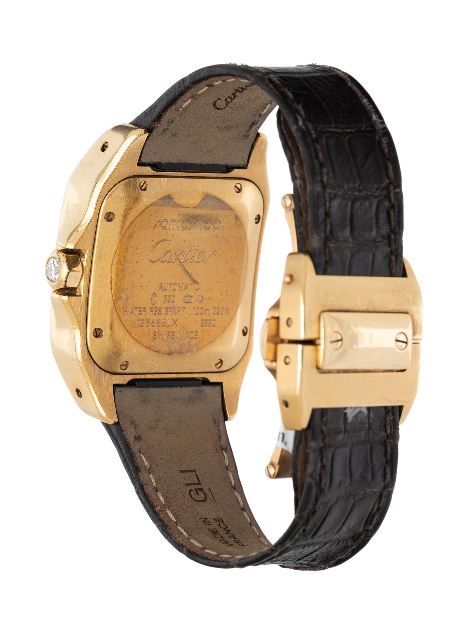 CARTIER, REF. 2880 18K YELLOW GOLD 'SANTOS 100' WATCH WITH FACTORY DIAMOND BEZEL, BOX & PAPERS