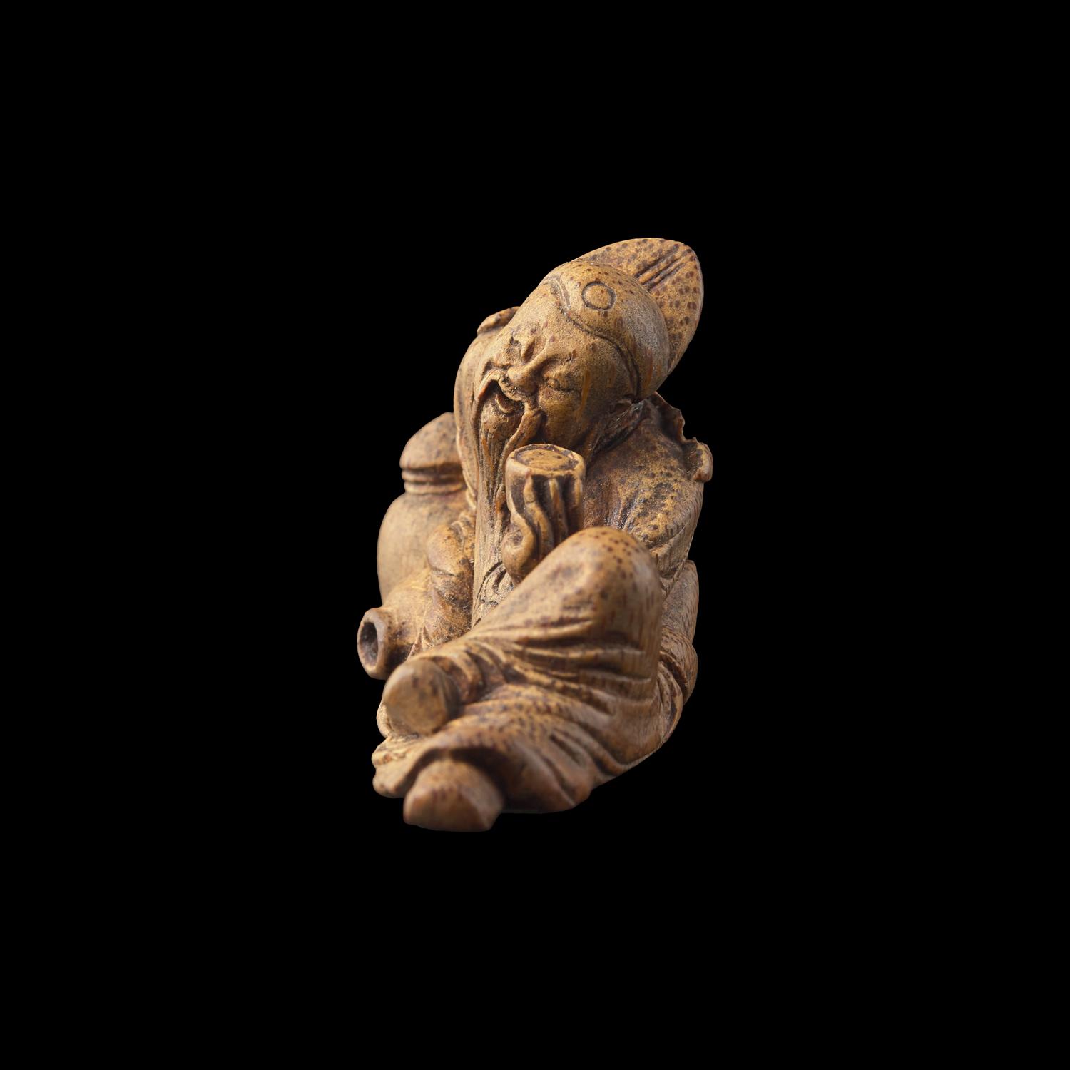 A Small Chinese Carved Bamboo Figure of Li Bai, 18th Century or Later 清中期或以後 竹雕太白醉酒