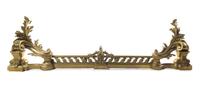 A Louis XV Style Gilt Metal Fireplace Suite Height 16 1/2 inches. — 19TH/20TH CENTURY