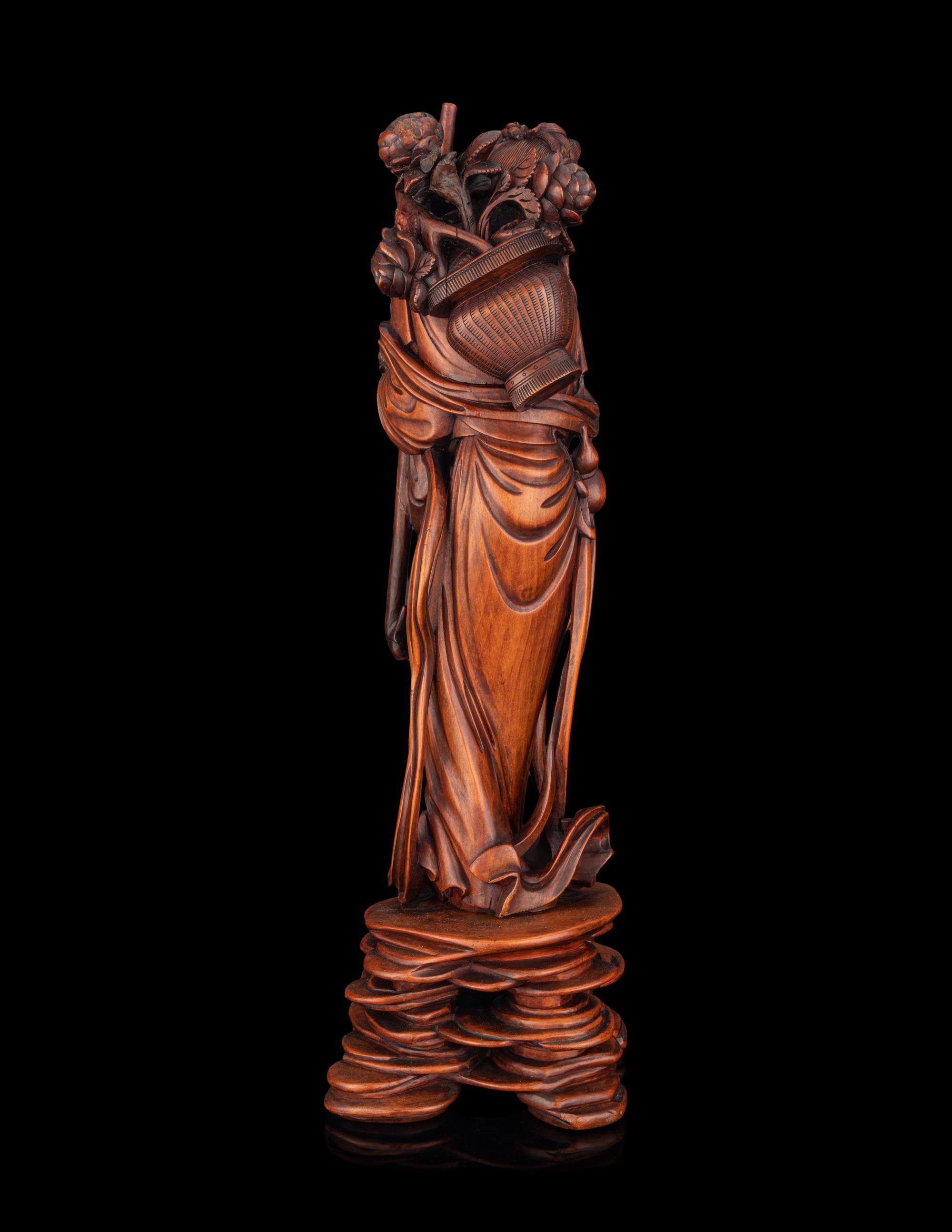 A Chinese Boxwood Figure of a Female Immortal
