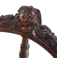 An English Carved Walnut Corner Chair