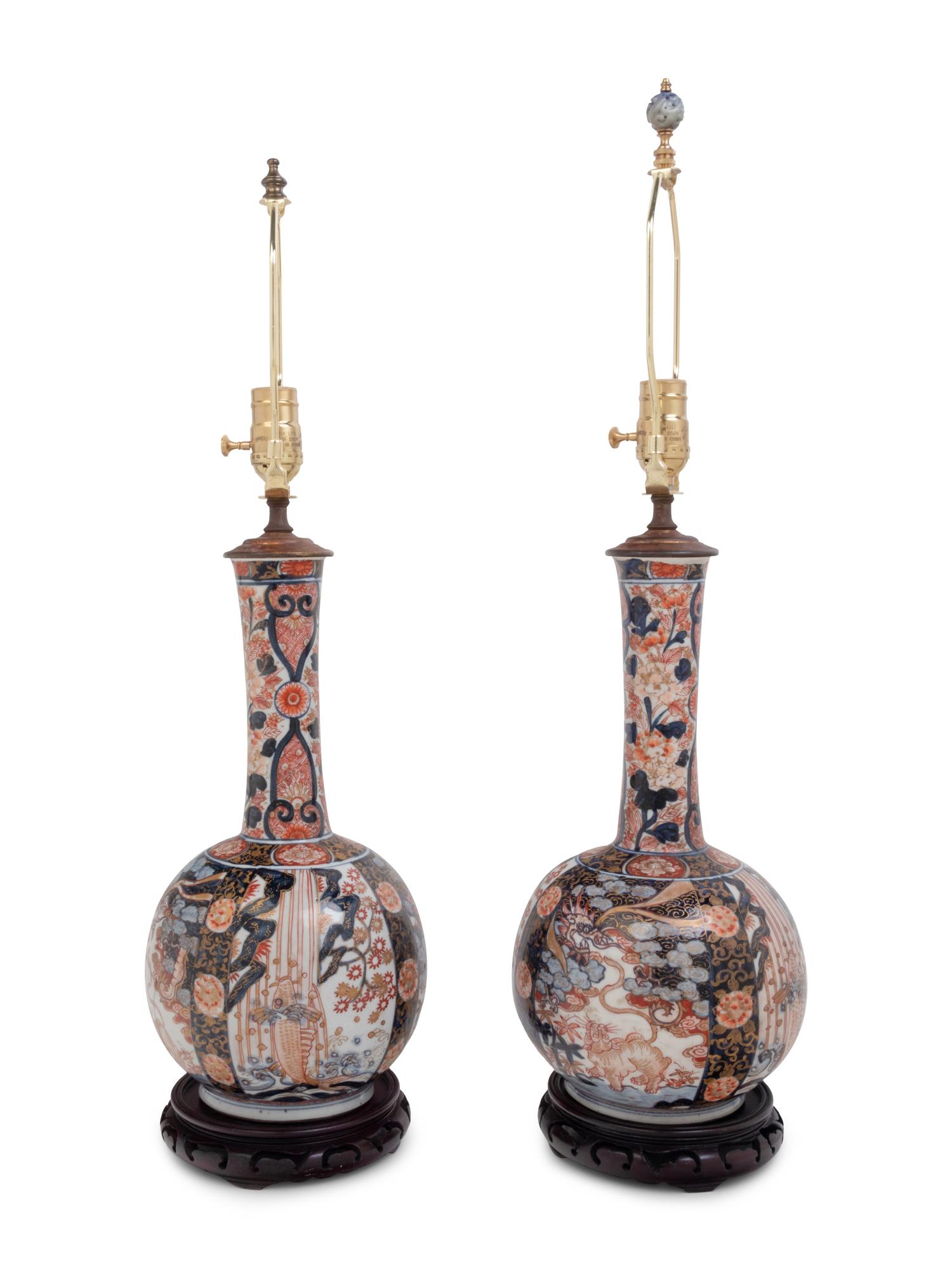 A Pair of Imari Palette Porcelain Bottle Vases Mounted as Lamps