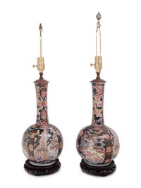 A Pair of Imari Palette Porcelain Bottle Vases Mounted as Lamps