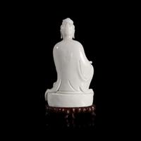 A Chinese blanc de chine figure of Guanyin 德化窑观音造像 "Dehua" and "Puji Yuren" mark ”??“ ? “????” ??