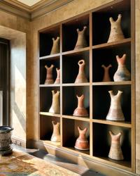 A Collection of Fourteen African Ceramic Headrests