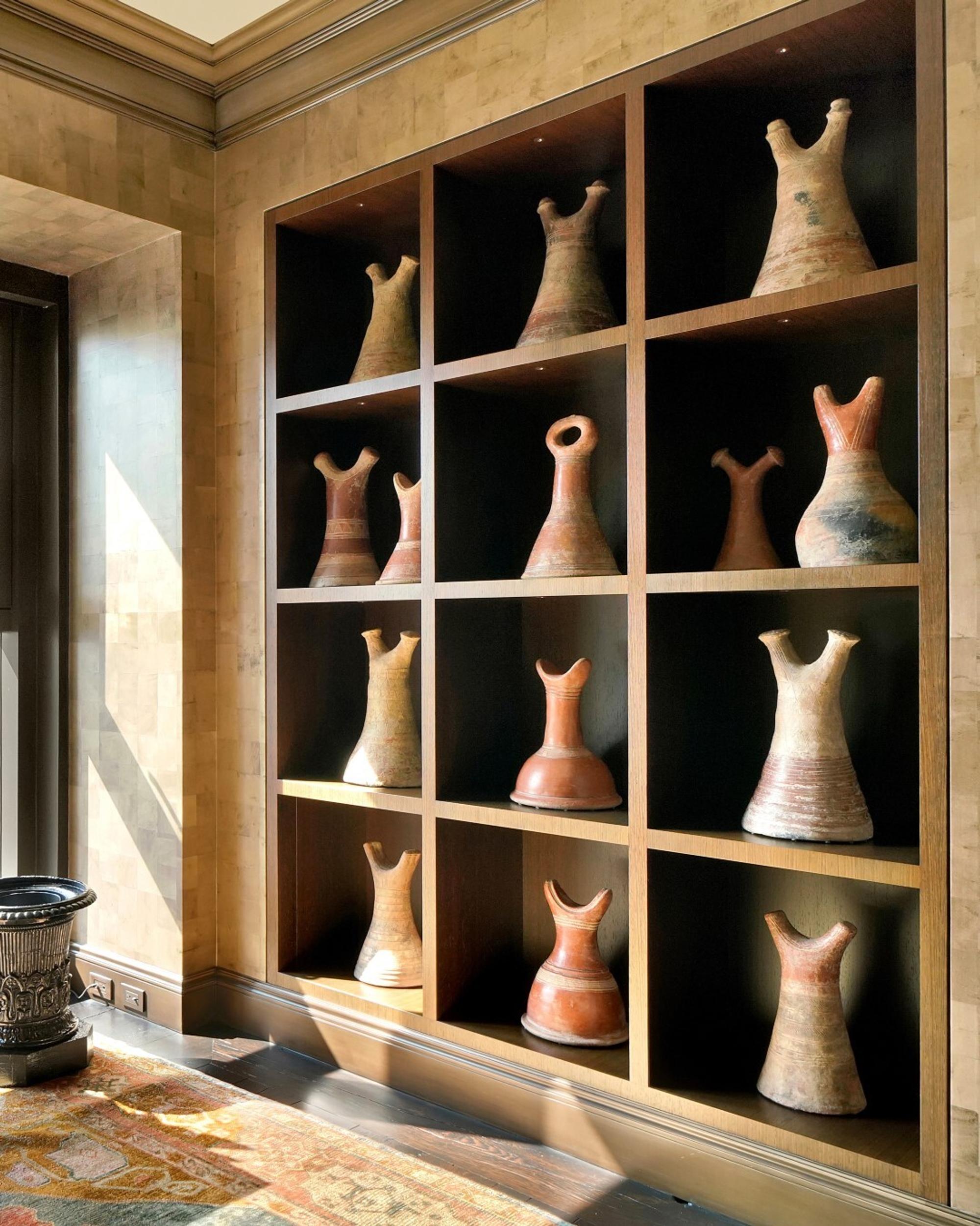 A Collection of Fourteen African Ceramic Headrests