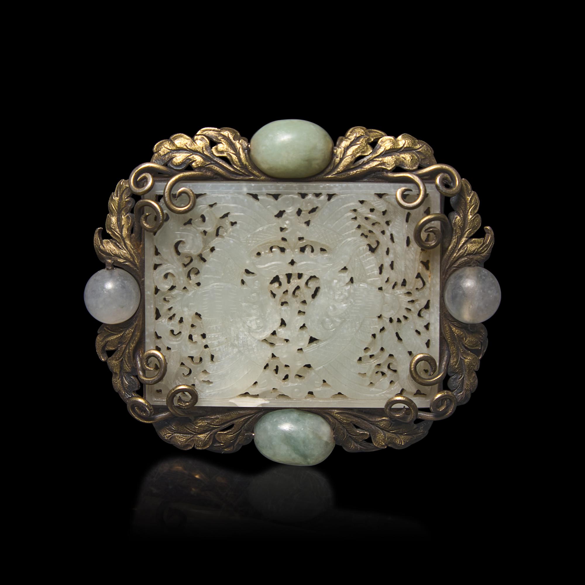 A Chinese White Jade 'Double Phoenix' Belt Plaque, Ming Dynasty 明 白玉鏤雕雙鳳紋帶板